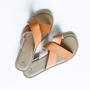 Gap Tan Slides across Cross